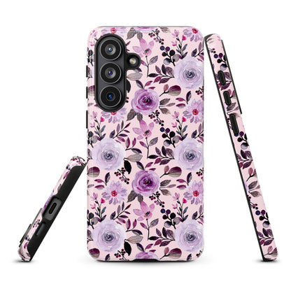 a phone case with a floral pattern in shades of pink and purple.