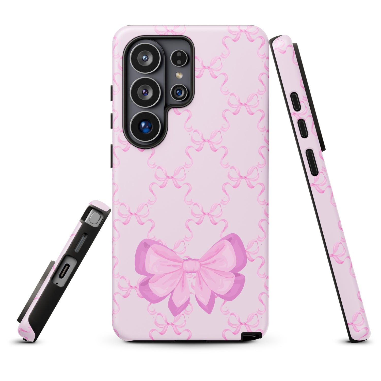 a pink phone case with a bow design.