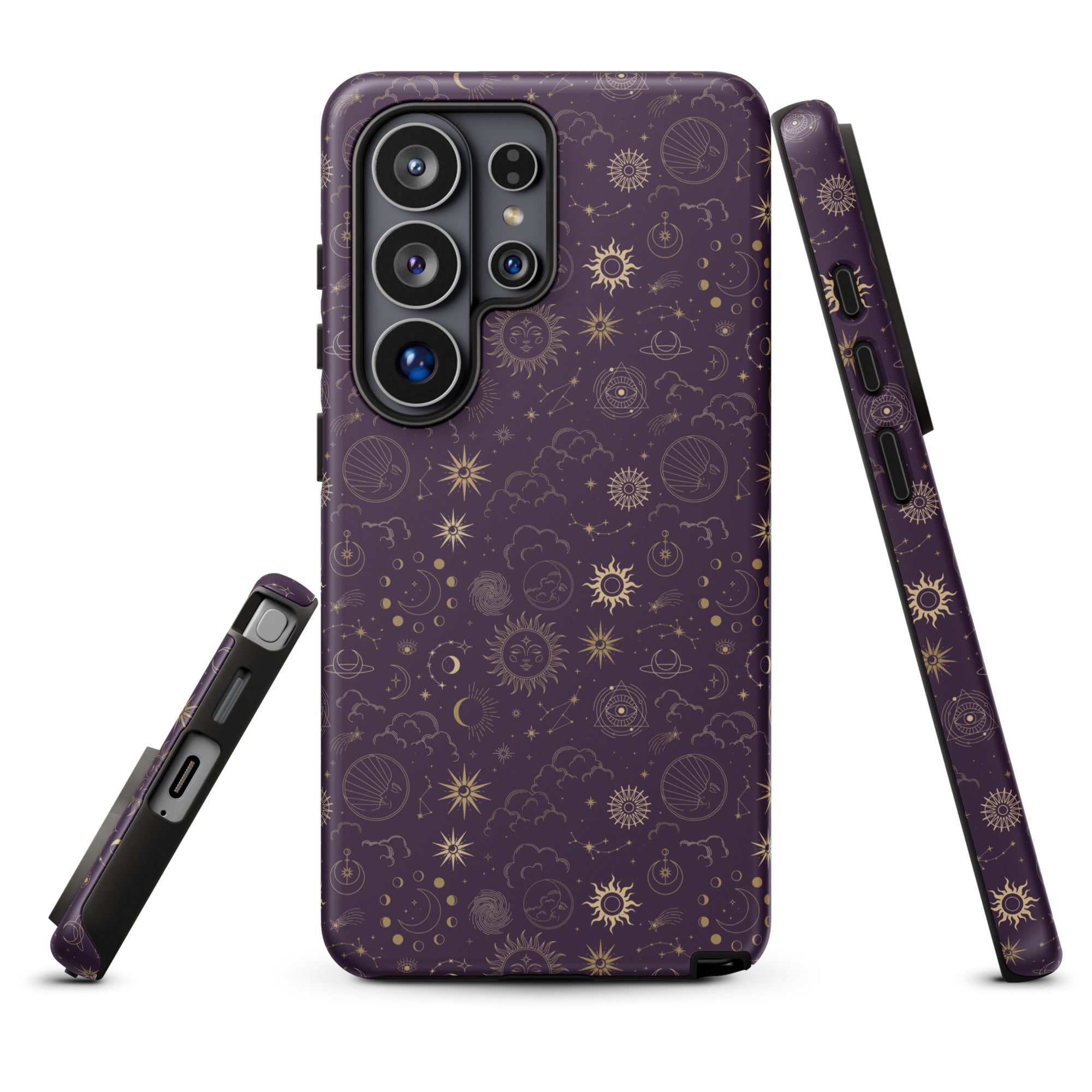 a purple phone case with a gold pattern of stars, planets, and other celestial elements.