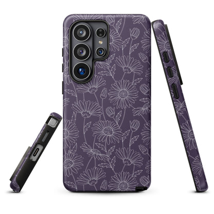 a purple phone case with a floral pattern, including white flowers and leaves.