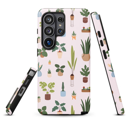 a phone case with a repeating pattern of various potted plants and other decorative elements.